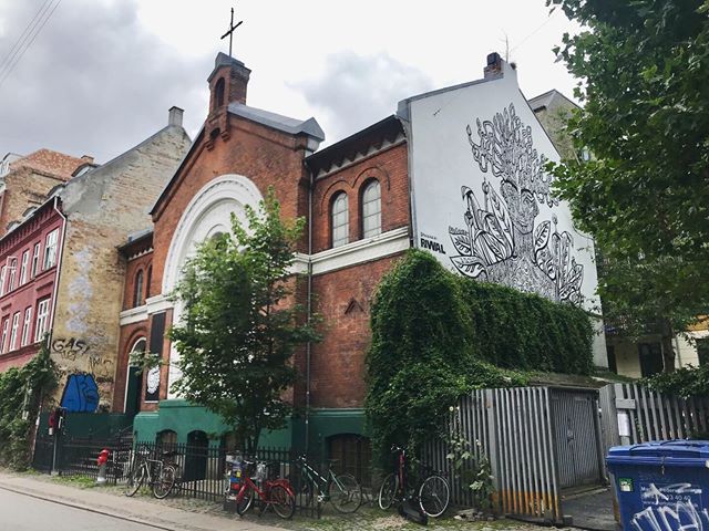 Photo of a group of people outside a theatre entrance